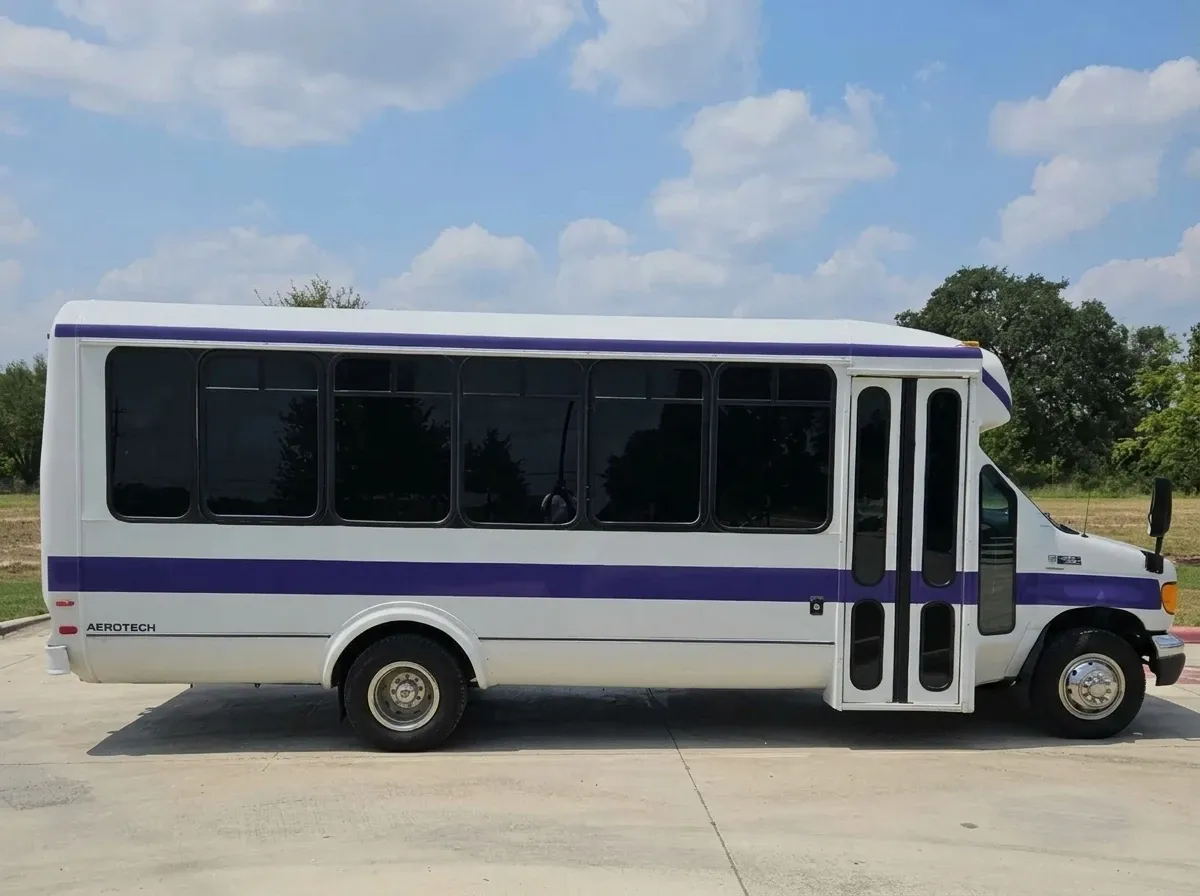 White-painted Purpleline Party Bus [3]