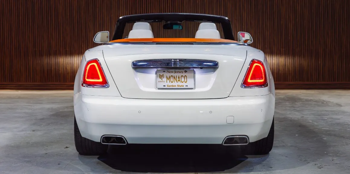 White Rolls Royce Dawn (Hermes) exterior with convertible roof, photo 5 for wedding car rental in Currituck County, NC