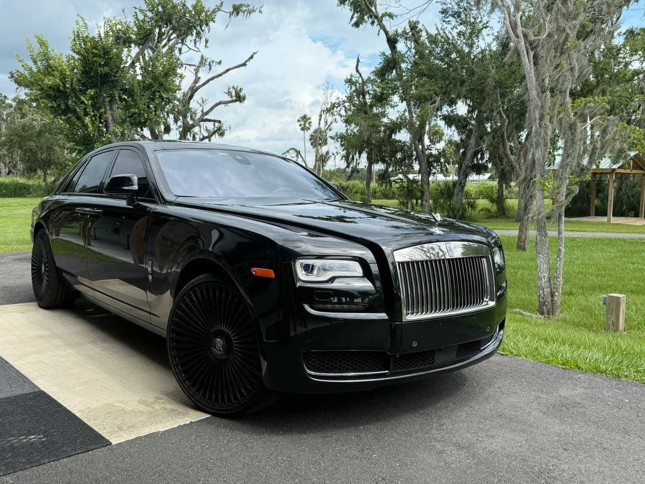 Black Rolls-Royce Ghost exterior for wedding car rental in Tampa, FL