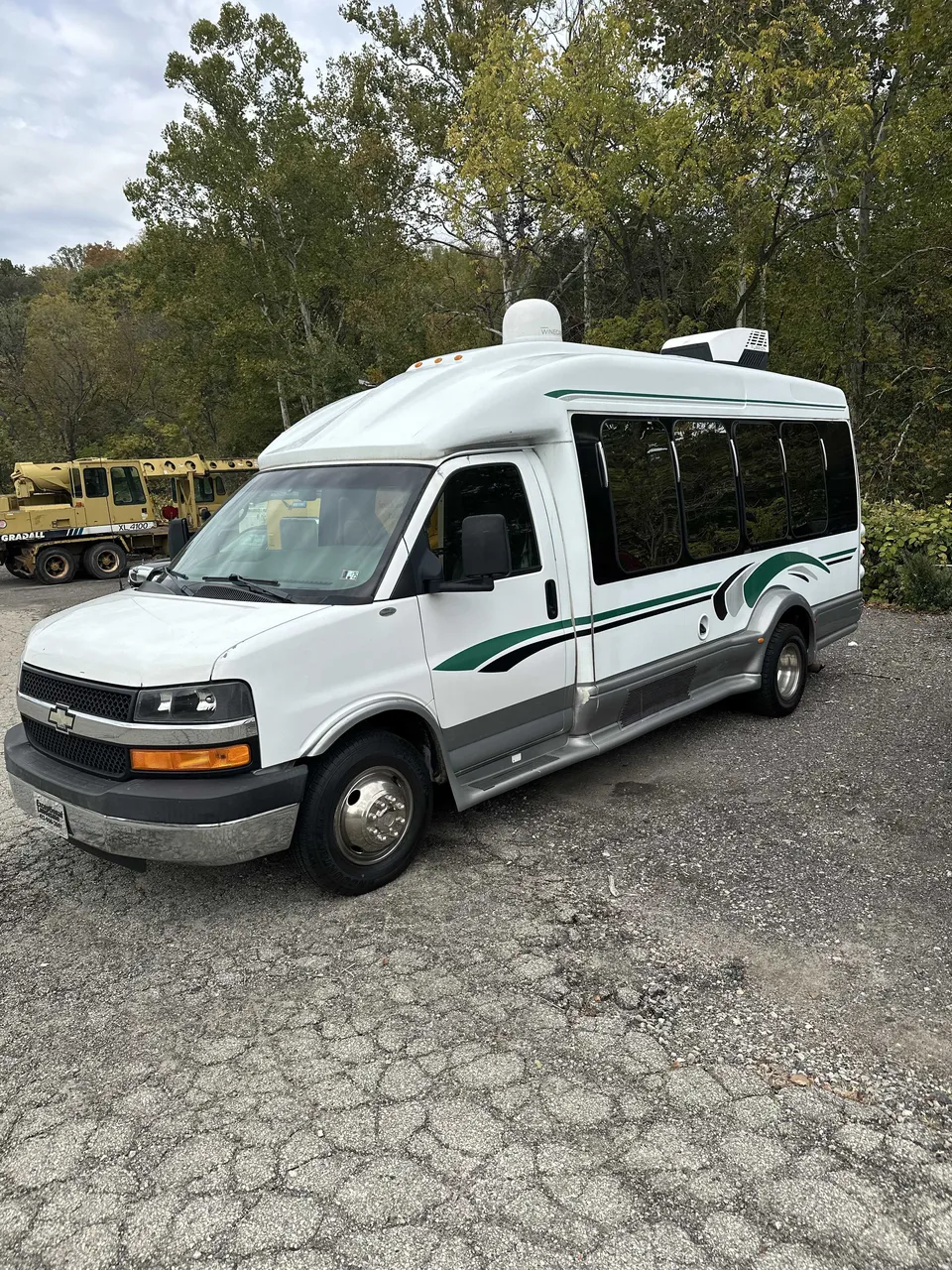 White Small party bus exterior with tinted windows for party bus rental in Union County, PA
