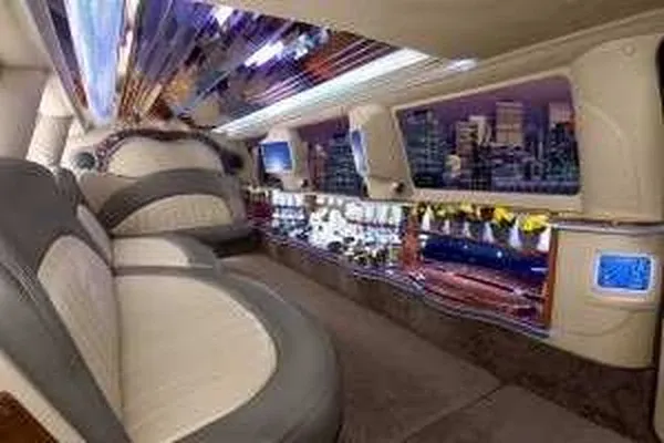 White Ford Excursion Limousine ready for booking